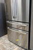 GE Profile PJE23BYWFS 36 Inch Counter-Depth Smart 4-Door French-Door Refrigerator with 23.2 cu. ft. Capacity, 4 Glass Shelves, Adjustable Temperature Drawer, TwinChill™, Dual-Dispense AutoFill Pitcher, and ENERGY STAR®: Stainless Steel