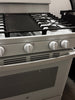 GE JGBS66DEKWW 30 Inch Free-Standing Gas Range with 5 Sealed Burners, 5.0 cu. ft. Oven Capacity, Broiler Drawer, Continuous Grates, Delay Bake, Steam Clean, Simmer Burner, Power Boil Burner, Central Oval Burner, and Integrated Non-Stick Griddle: White