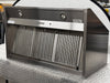 GE UVW93642PSS 36 Inch Commercial Wall Mount Range Hood with 590 CFM Blower, Heat Sensor, Hidden Controls, QuietBoost™, Four-Speed Fan Control, LED Hood Light, Wi-Fi, and ADA Compliant: Stainless Steel
