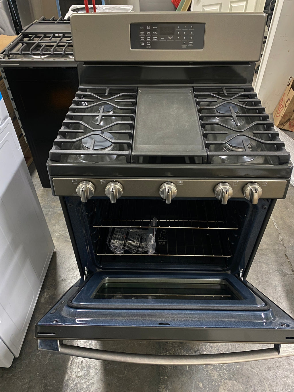 GE 30 in. 5.0 cu. ft. Air Fry Convection Oven Freestanding Gas Range with 5  Sealed Burners & Griddle - Stainless Steel