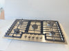 Bosch 500 Series  NGM5659UC 36 Inch Gas Cooktop with 5 Sealed Burners, Continuous Cast Iron Grates, OptiSim® Burner, Distinctive Red LED Light, One-Piece Stainless Steel Design, and ADA Compliant: Stainless Steel