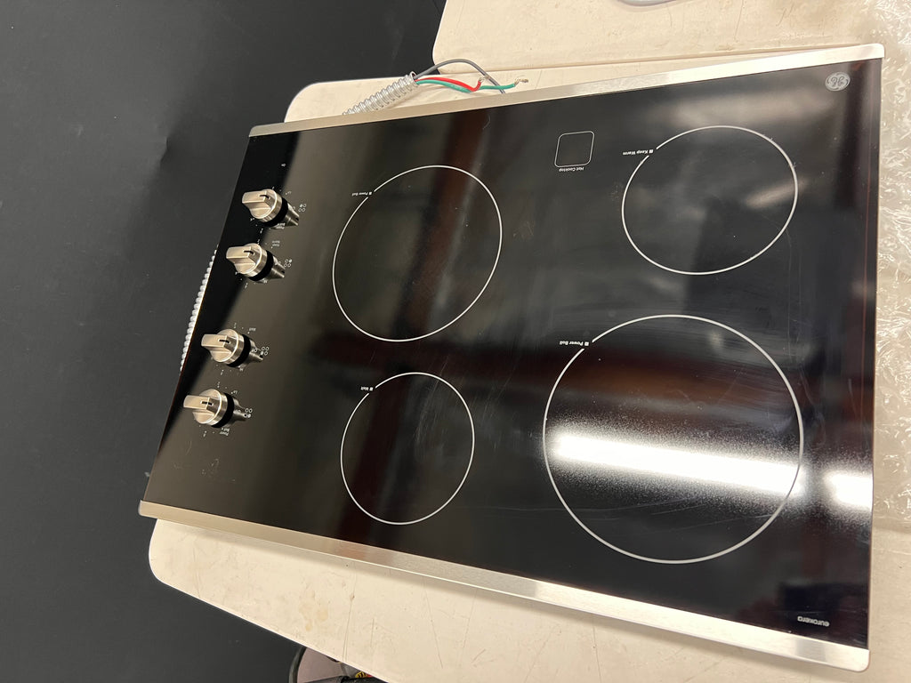 GE  JP3030SWSS 30 Inch Electric Cooktop with 4 Radiant Elements, Ceramic Glass Surface, Power Boil Elements, Keep Warm Setting, Melt Setting, Hot Surface Indicator Lights, GE Fits! Guarantee, UL Certified, and ADA Compliant: Stainless Steel