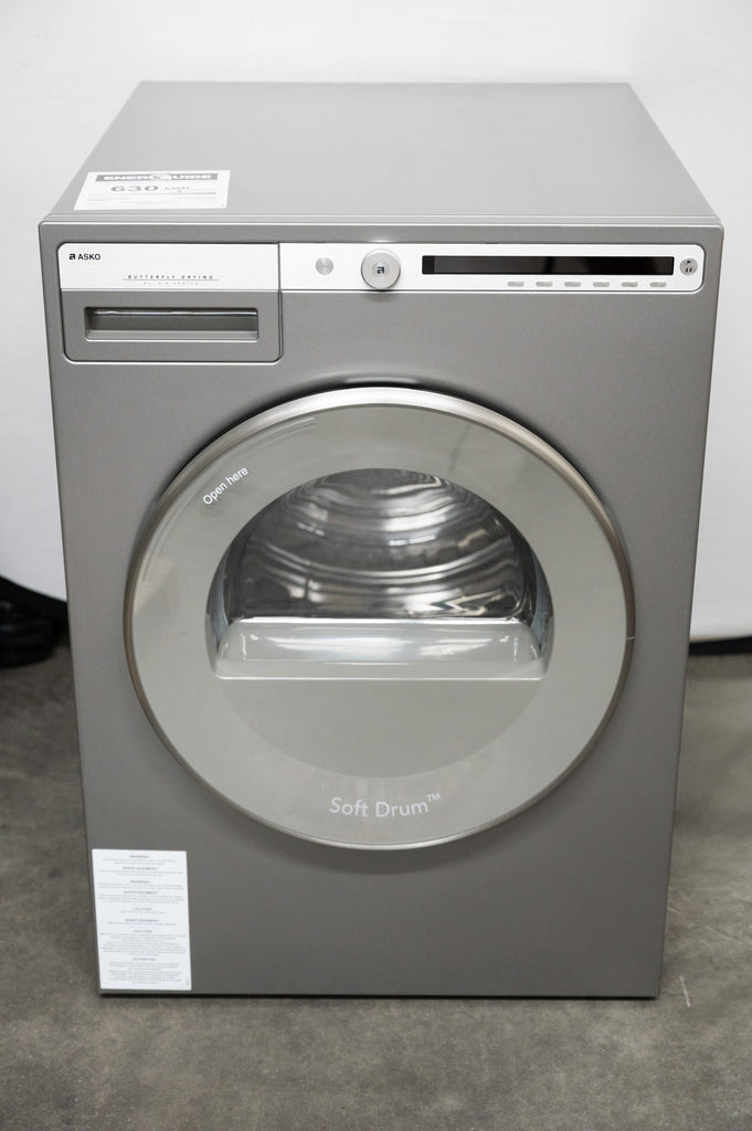 ASKO Logic Series  T411VDT 24 Inch Electric Dryer with 5.1 Cu. Ft. Capacity, Butterfly™ Drying System, Soft Drum™ Technology, LCD Display, Interior Light, Line Concept™, 13 Dry Programs, Sensi Dry™, Auto Synthetic, Airing Option, and Anti-Crease: Titanium